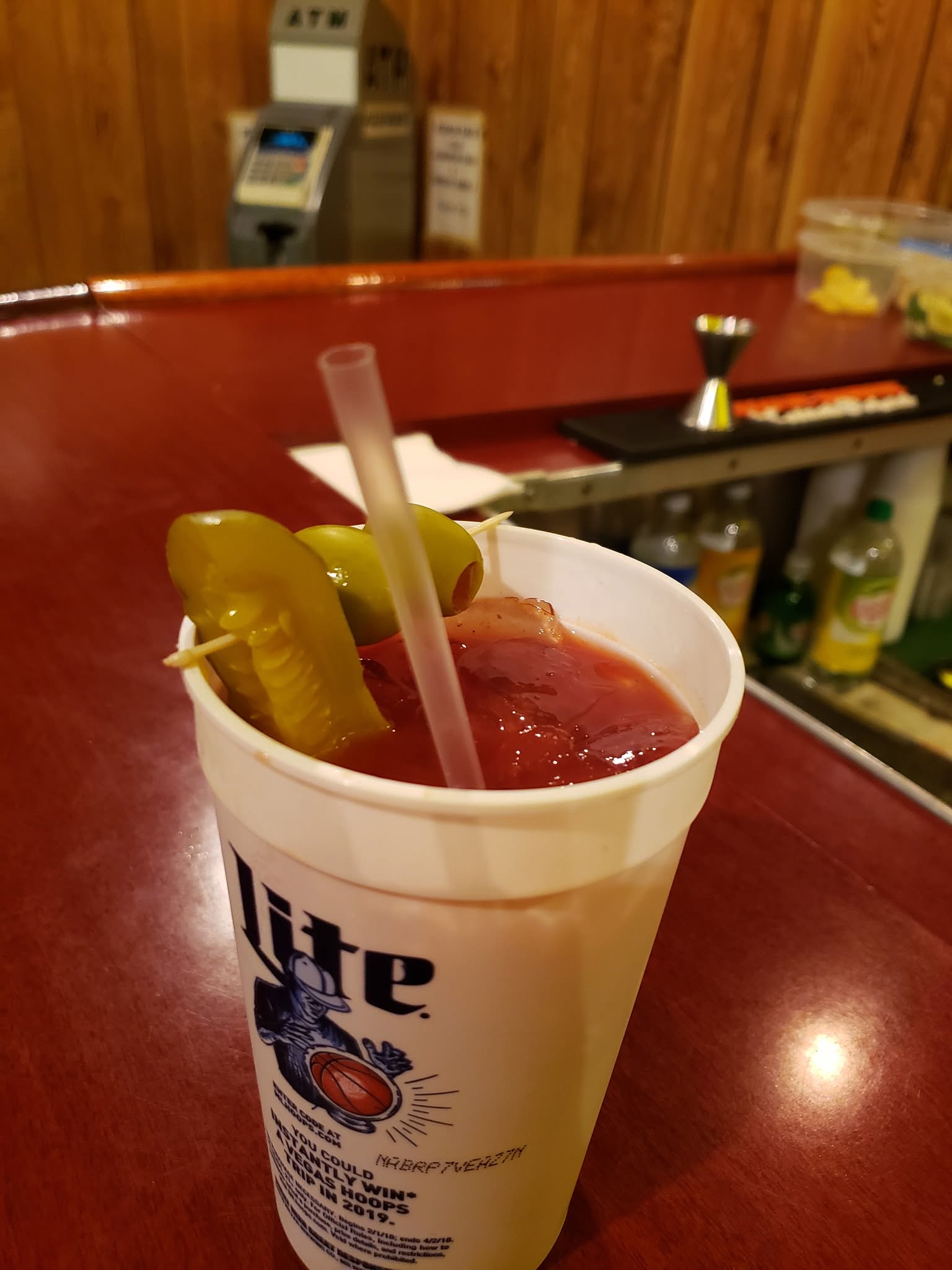 A garnished bloody mary on the bar top