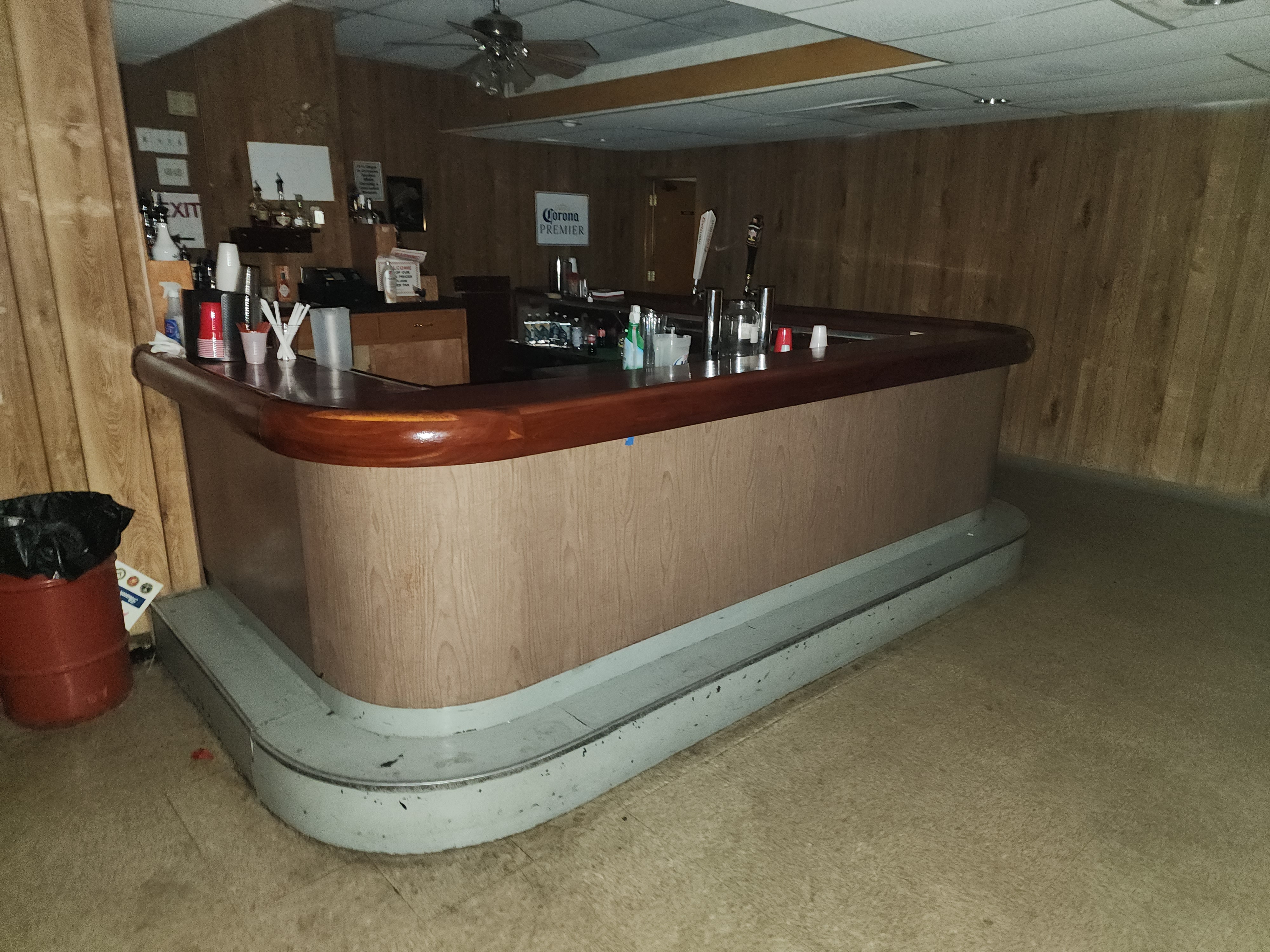 The bar from the entrance end, taps and back bar behind it