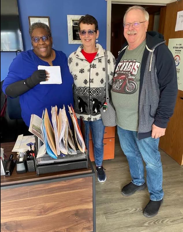 Three Aerie 281 members together in the club office
