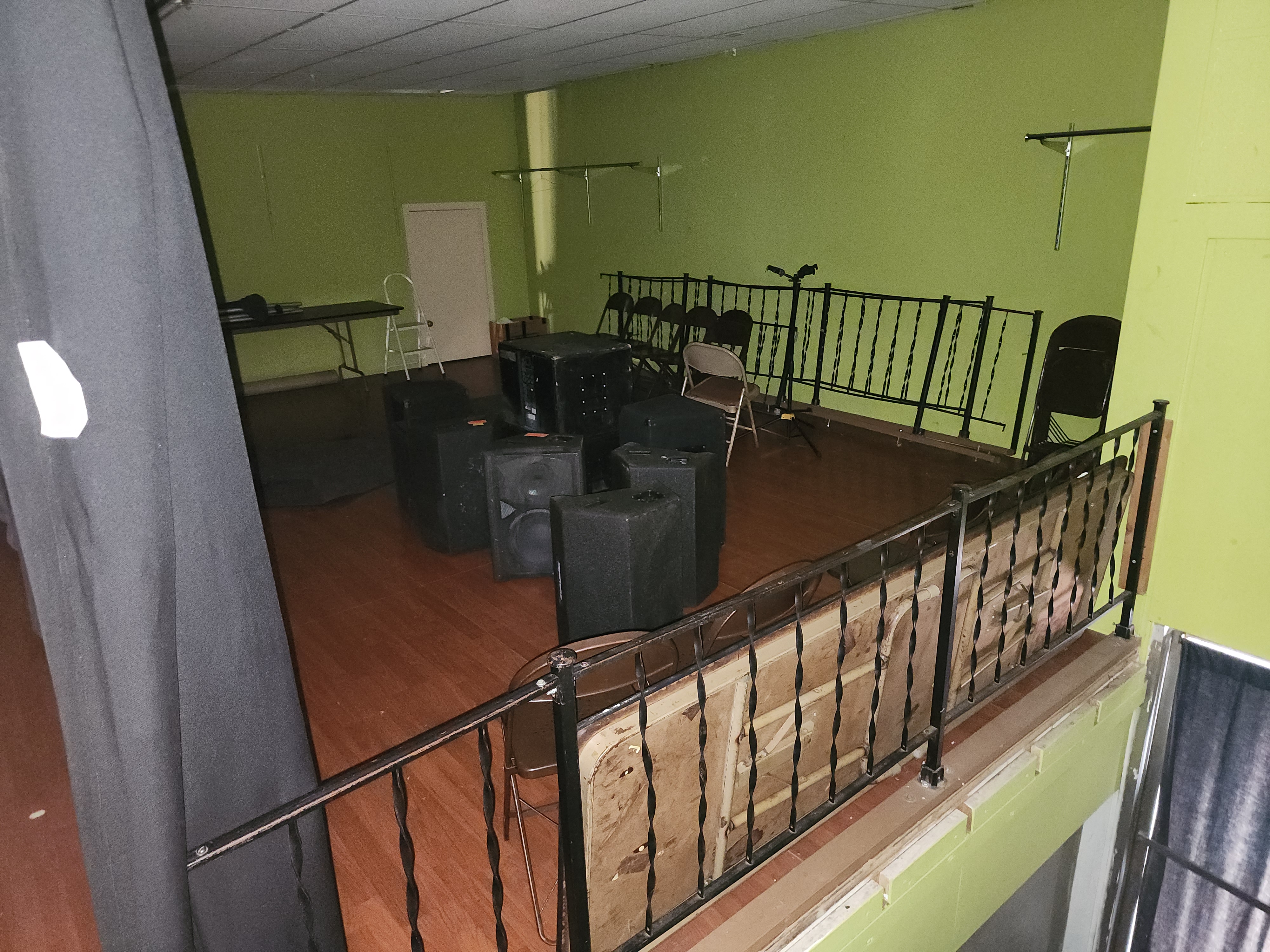 The view from the stage across the house speakers and monitor wedges